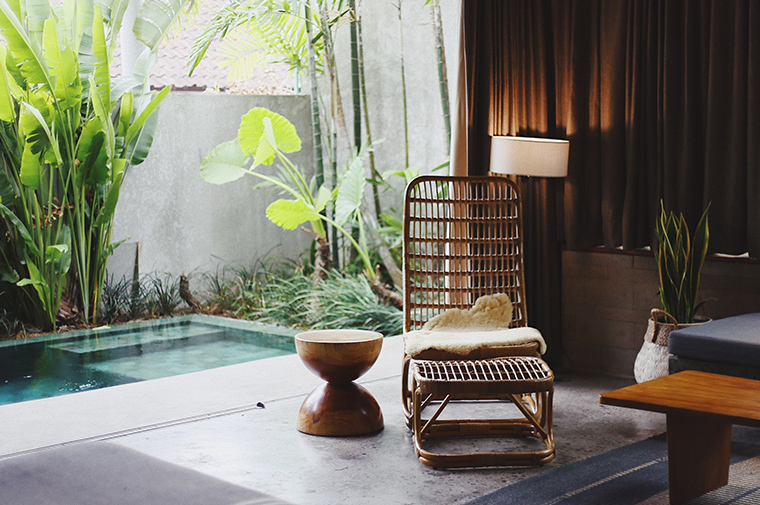 Outdoor chair next to pool